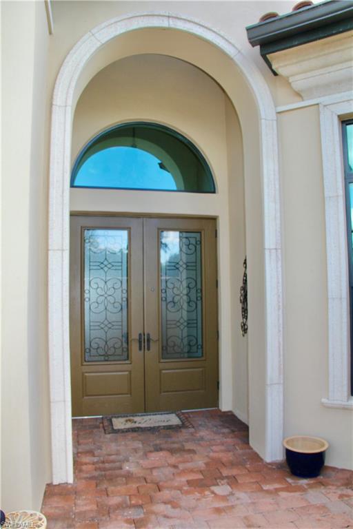 9321 Vercelli Court Naples, FL 34113 - Photo 5 of 49 a view of entrance door