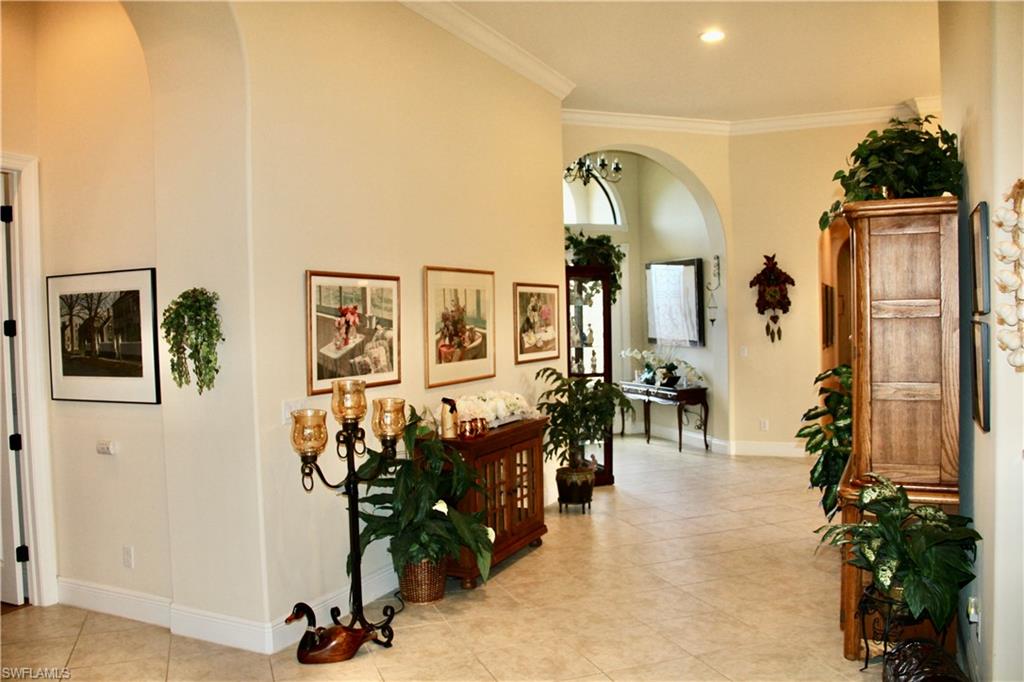 9321 Vercelli Court Naples, FL 34113 - Photo 7 of 49 a view of living room