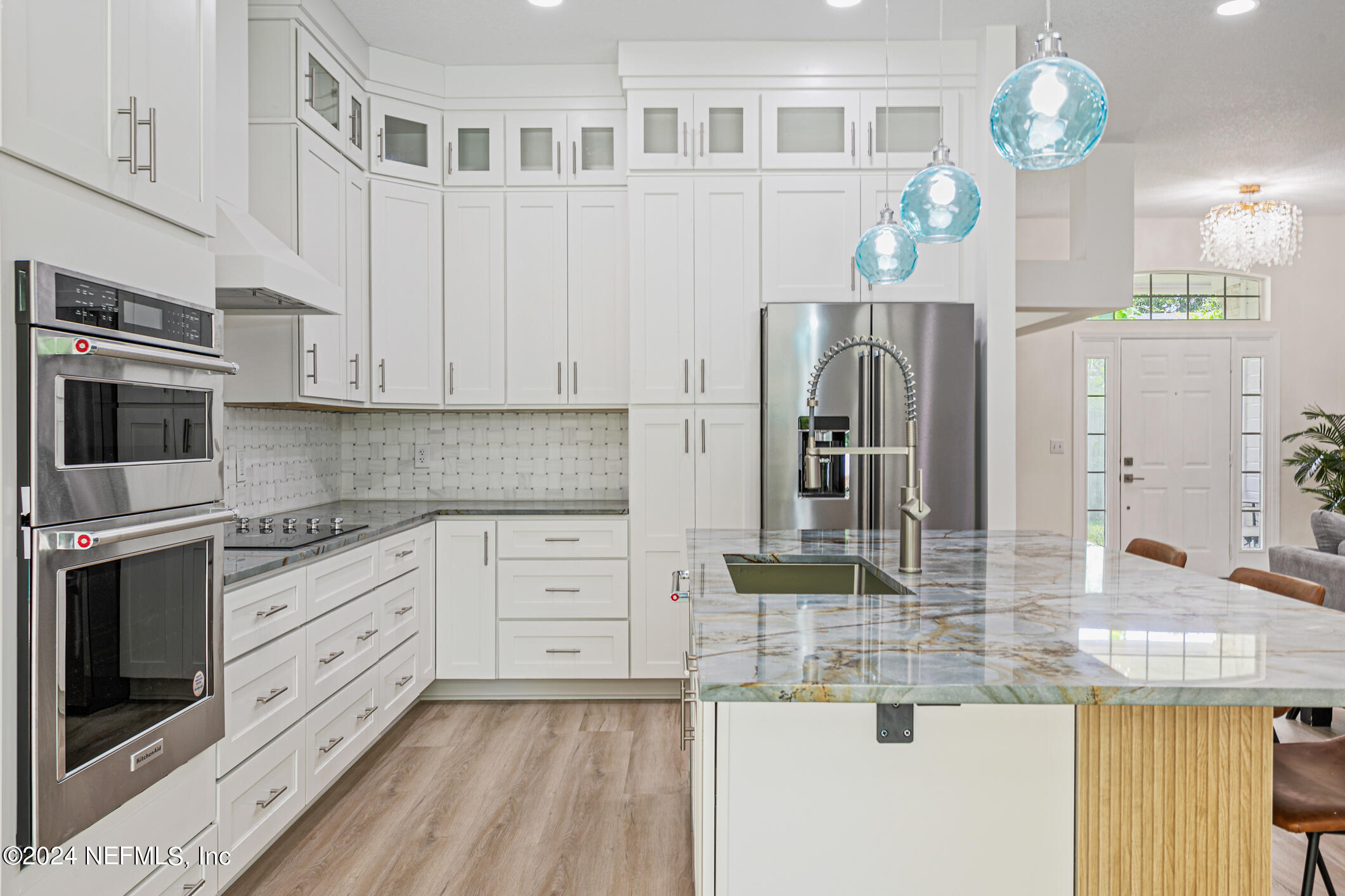 622 Cherry Street Neptune Beach, FL 32266 - Photo 16 of 77 a kitchen with stainless steel appliances granite countertop a stove and cabinets