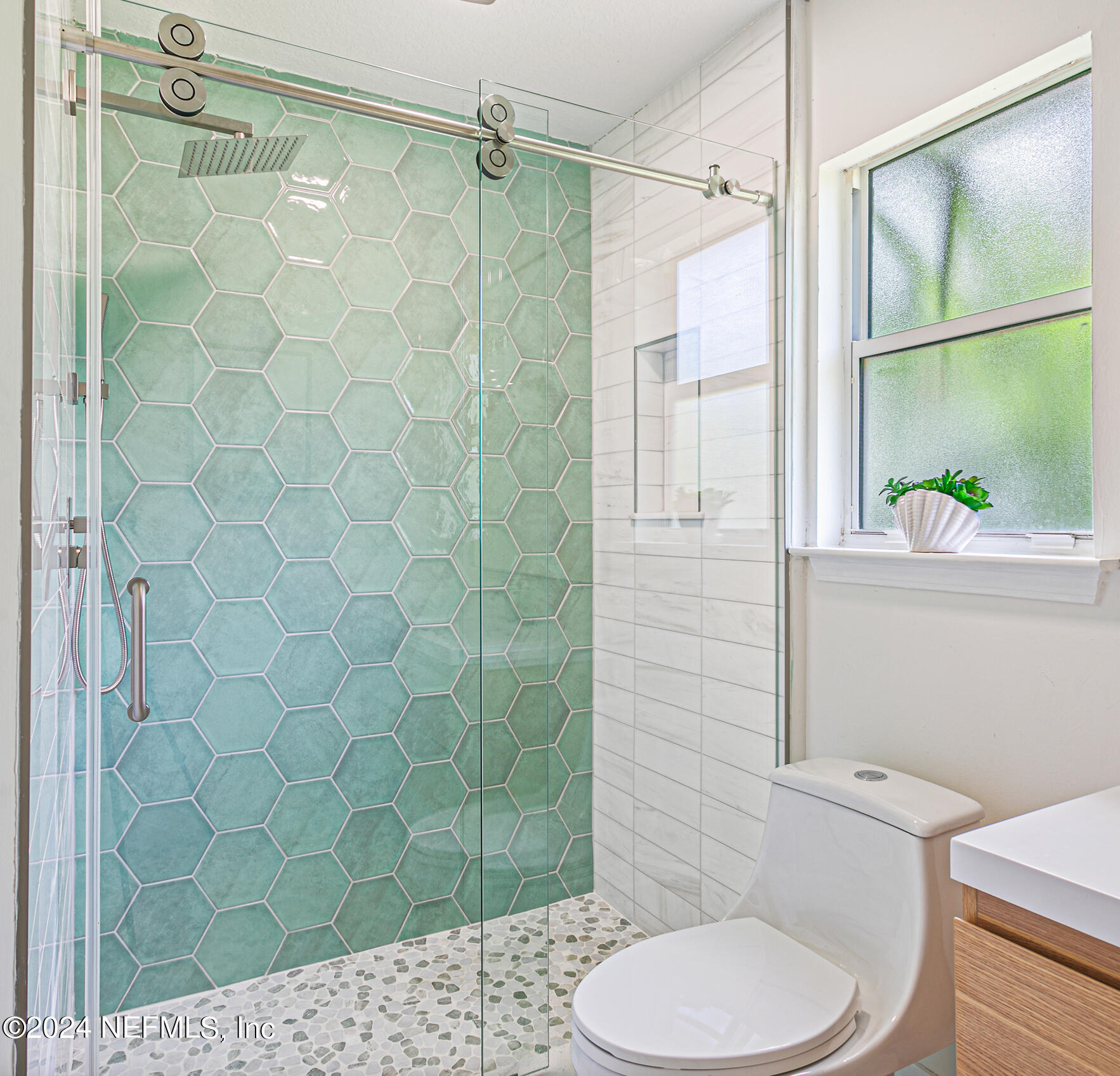 622 Cherry Street Neptune Beach, FL 32266 - Photo 37 of 77 a bathroom with a toilet and a shower