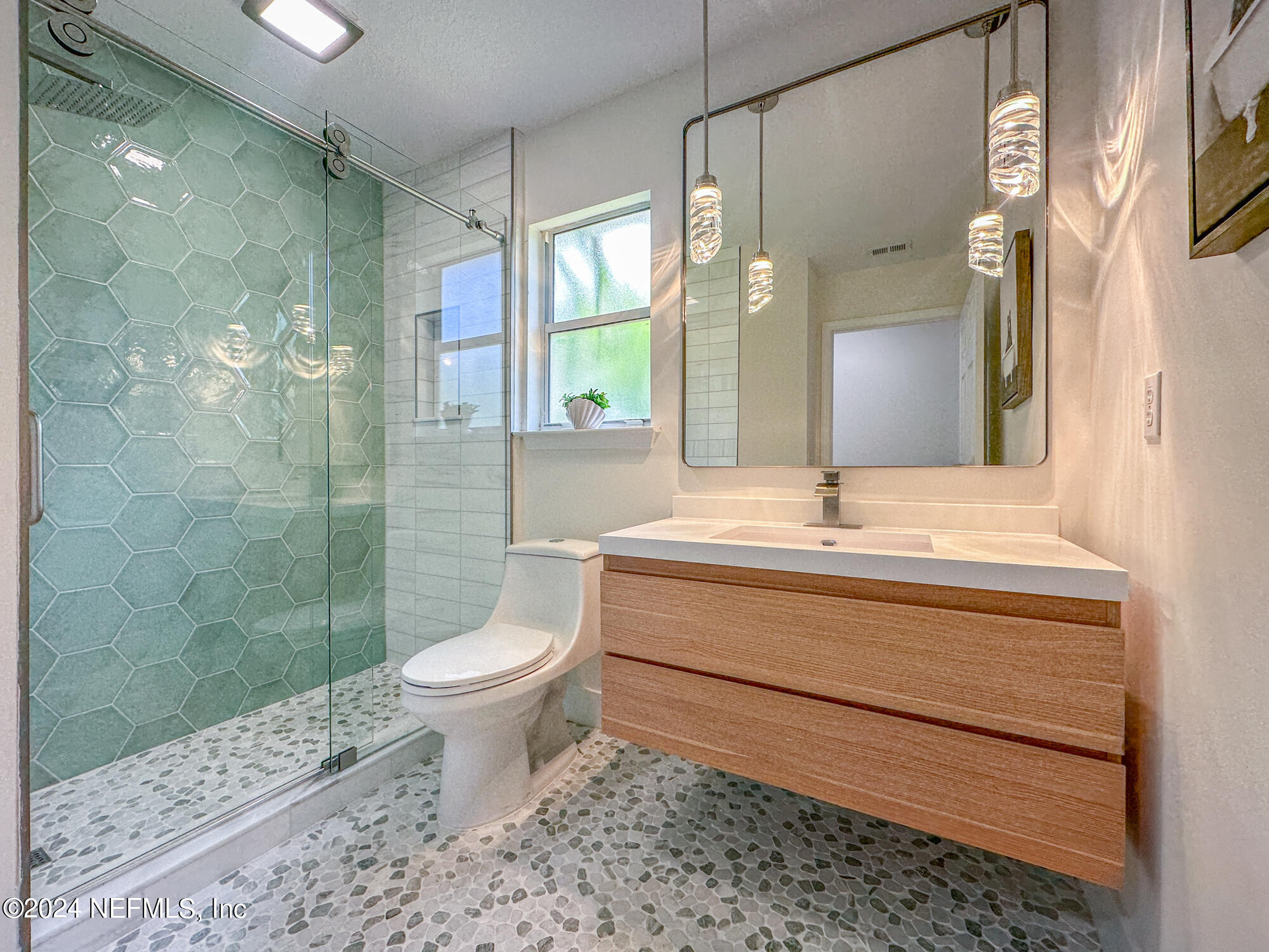 622 Cherry Street Neptune Beach, FL 32266 - Photo 38 of 77 a bathroom with a sink toilet and shower
