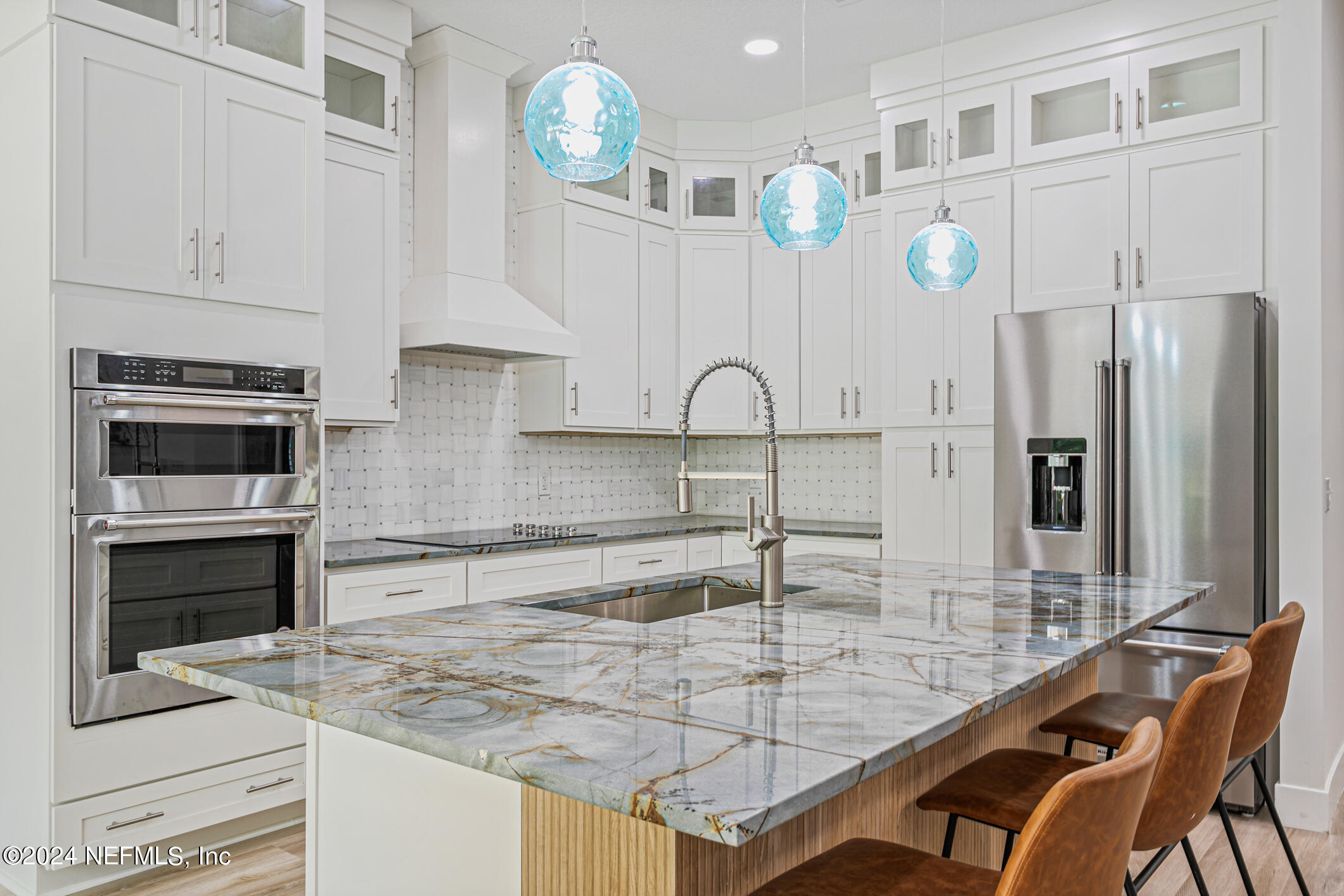 622 Cherry Street Neptune Beach, FL 32266 - Photo 10 of 77 a kitchen with stainless steel appliances granite countertop a sink and cabinets