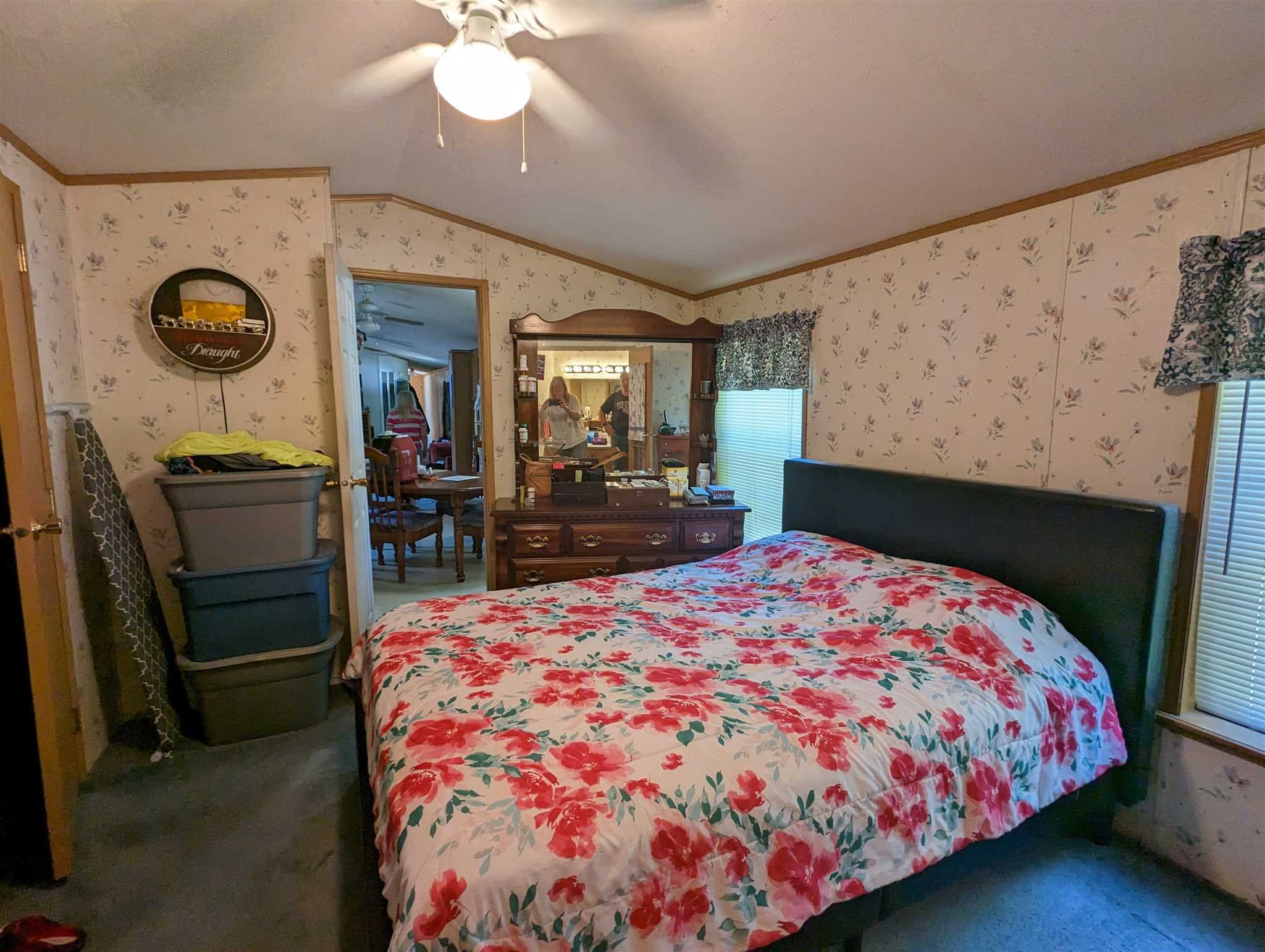 9 Depew Park Wallkill, NY 12589 - Photo 11 of 19 a bedroom with a bed and a dresser with mirror
