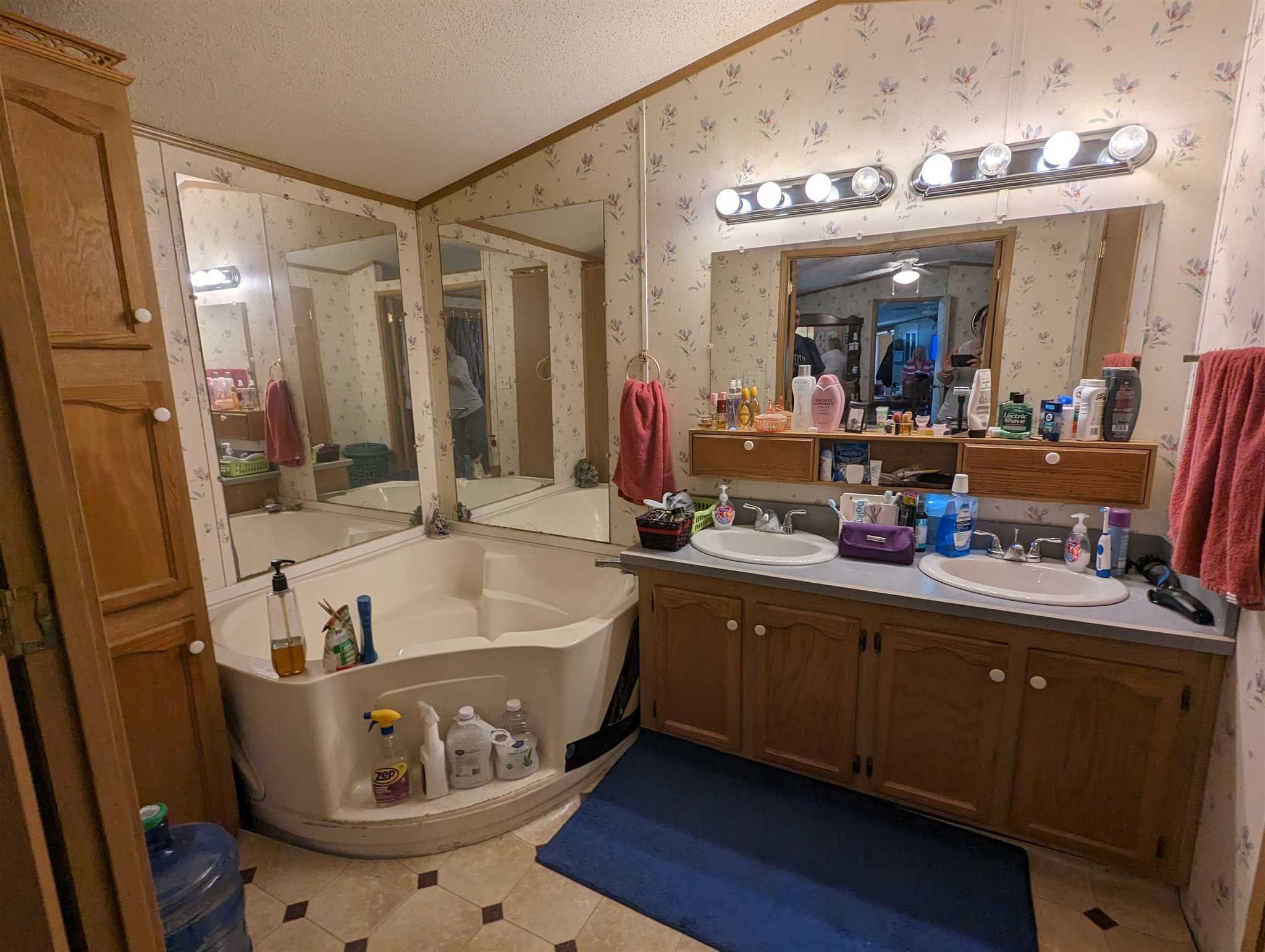 9 Depew Park Wallkill, NY 12589 - Photo 13 of 19 a bathroom with a tub sink and mirror