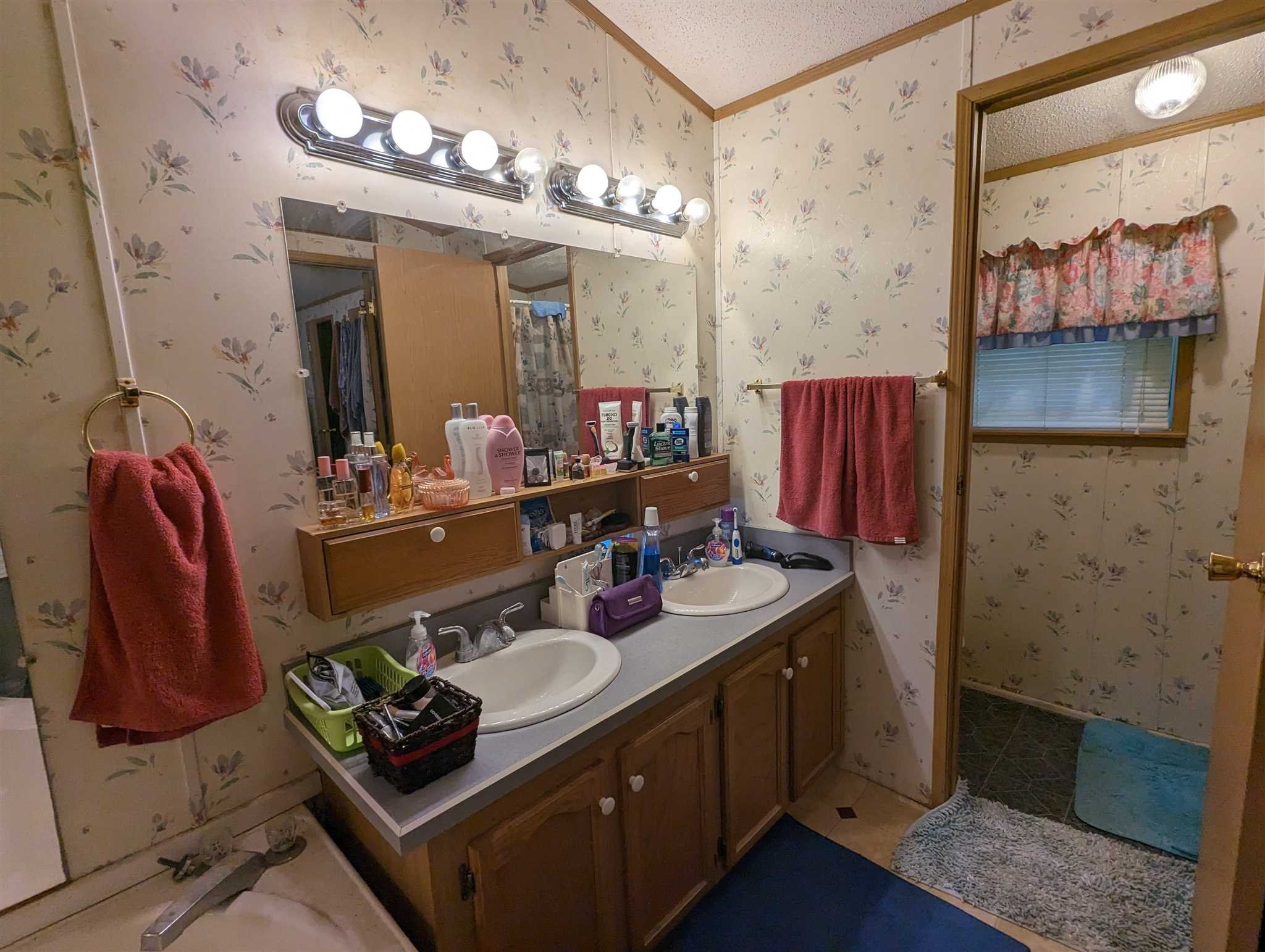 9 Depew Park Wallkill, NY 12589 - Photo 14 of 19 a bathroom with a sink double vanity and mirror