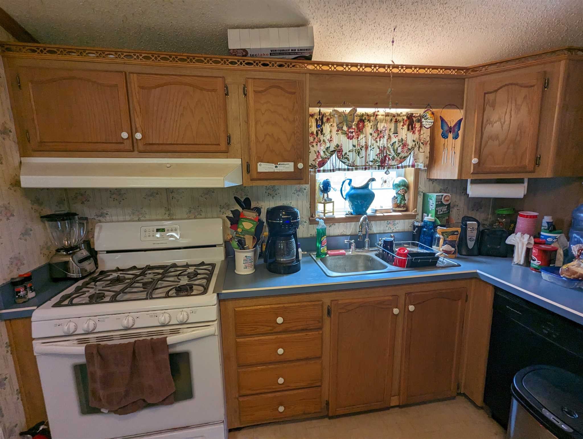 9 Depew Park Wallkill, NY 12589 - Photo 3 of 19 a kitchen with stainless steel appliances granite countertop a stove a sink dishwasher and cabinets with wooden floor