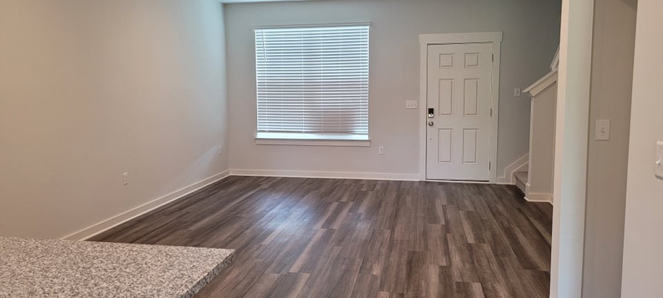 1733 Frodo Way Murfreesboro, TN 37128 - Photo 5 of 42 an empty room with wooden floor and windows