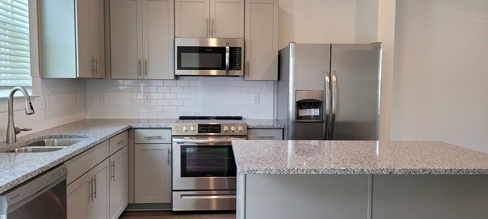 1733 Frodo Way Murfreesboro, TN 37128 - Photo 9 of 42 a kitchen with stainless steel appliances granite countertop a sink and a stove