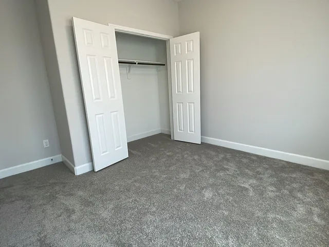an empty room with a door