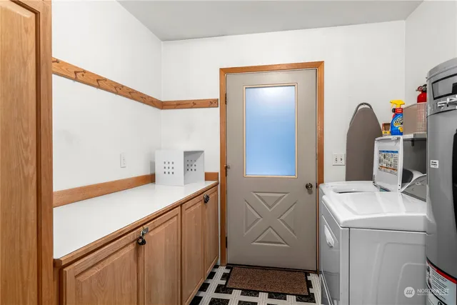 a backyard of a house with yard and garage