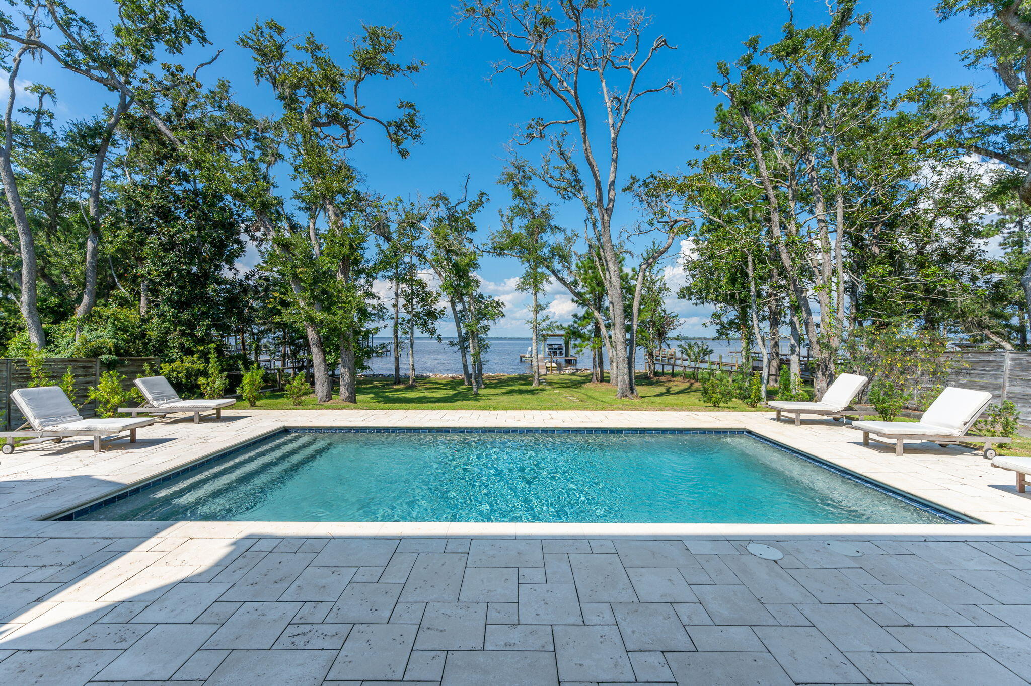 164 Bay Trace Santa Rosa Beach, FL 32459 - Photo 10 of 90 a view of a swimming pool with lounge chair