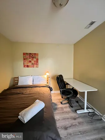 a room with a table and chairs