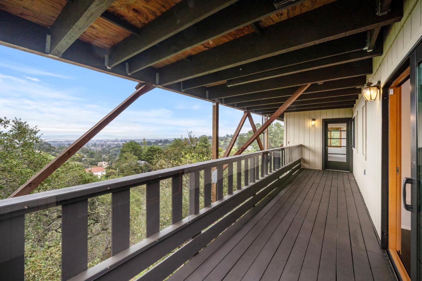 15 Anson Road, Unit B Hillsborough, CA 94010 - Photo 13 of 25 a view of a balcony with wooden floor