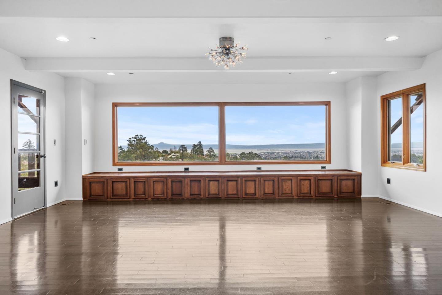 15 Anson Road, Unit B Hillsborough, CA 94010 - Photo 21 of 25 a living room with a large window