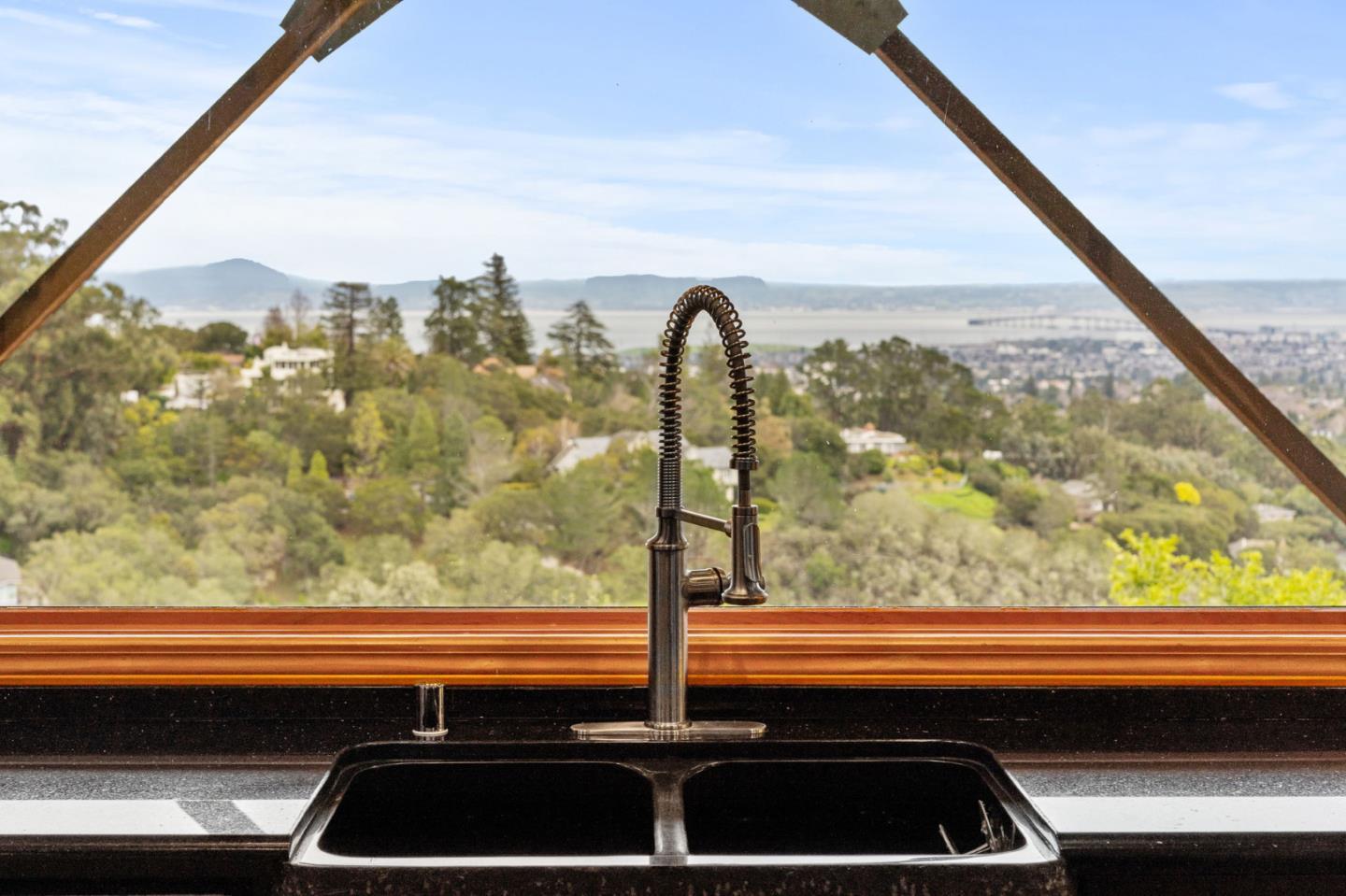 15 Anson Road, Unit B Hillsborough, CA 94010 - Photo 4 of 25 a view of a back yard from a window