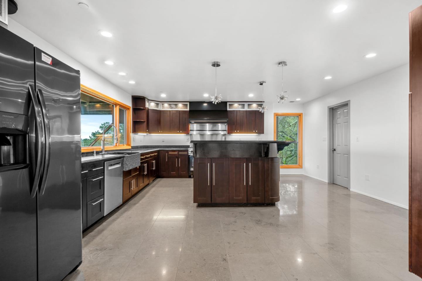 15 Anson Road, Unit B Hillsborough, CA 94010 - Photo 5 of 25 a kitchen with stainless steel appliances granite countertop a refrigerator a sink a stove and a microwave