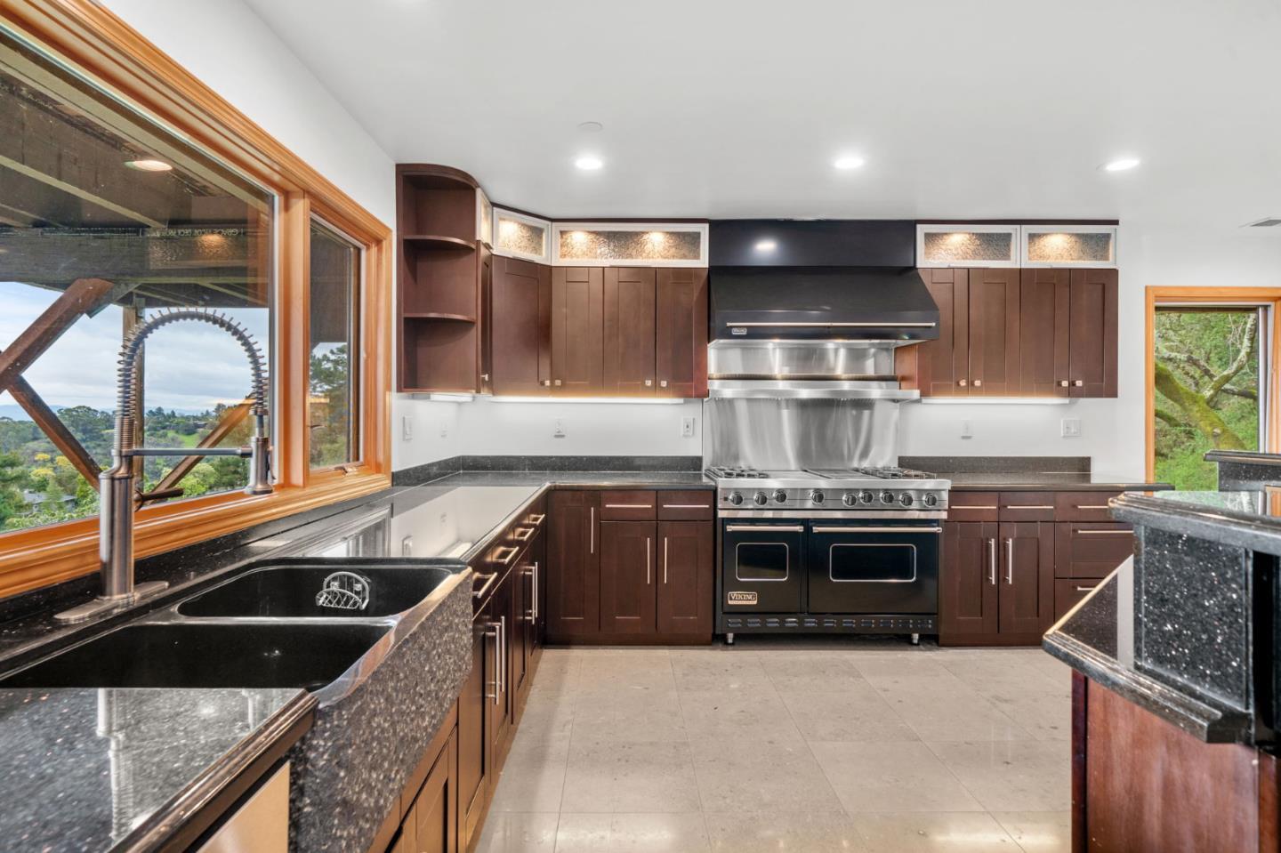 15 Anson Road, Unit B Hillsborough, CA 94010 - Photo 6 of 25 a kitchen with stainless steel appliances granite countertop a stove and a sink