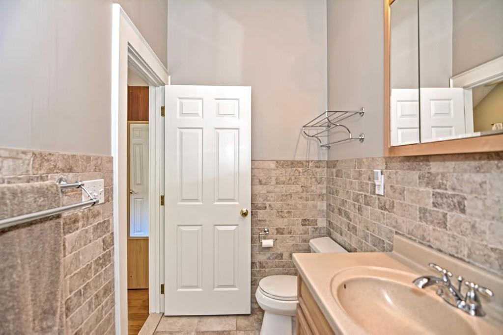 35 Shea Road Cambridge, MA 02140 - Photo 16 of 29 a bathroom with a sink a toilet and shower