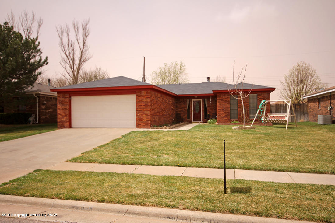 5320 Wheeler Lane Amarillo, TX 79110 - Photo 1 of 23 a front view of a house with garden
