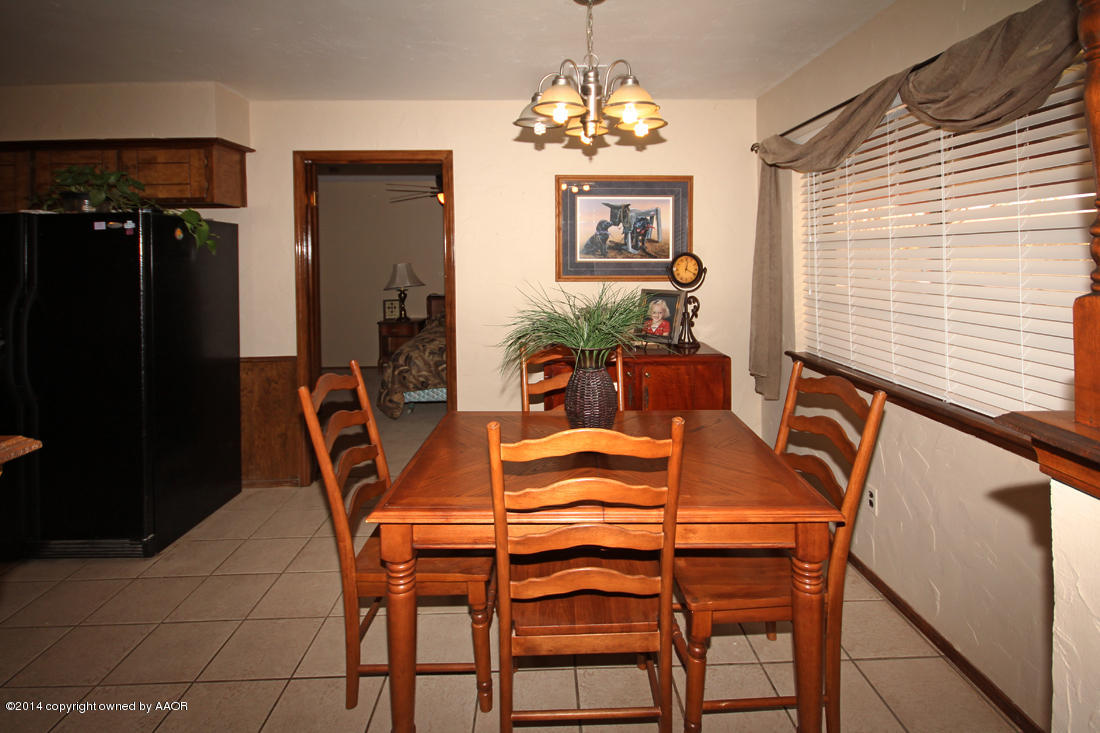 5320 Wheeler Lane Amarillo, TX 79110 - Photo 7 of 23 a dining room with furniture and window