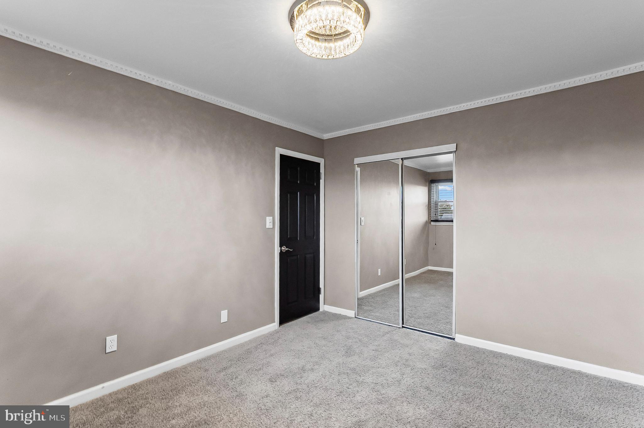 6955 Blanche Road Baltimore, MD 21215 - Photo 15 of 26 an empty room with a empty space and a window