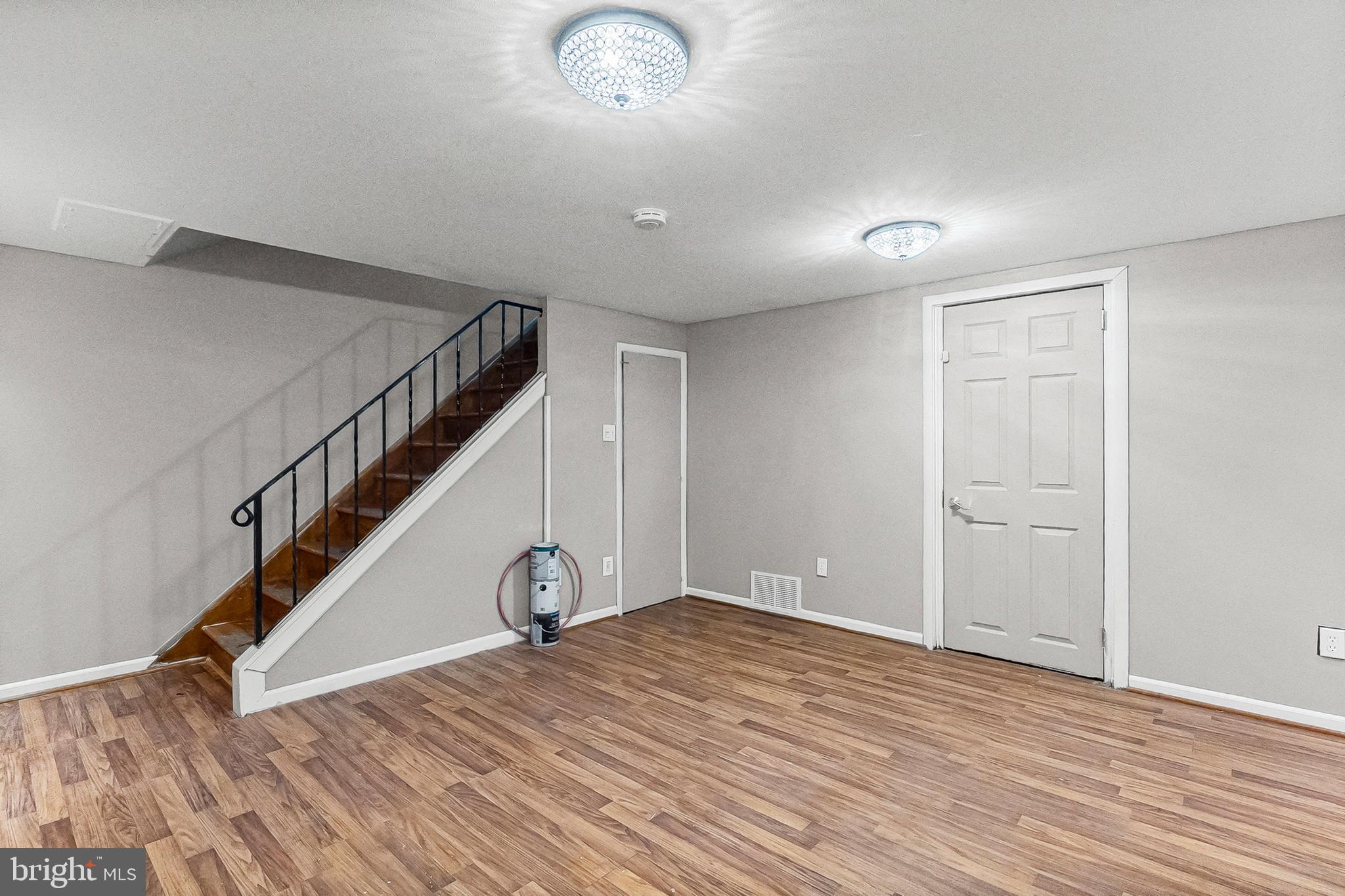 6955 Blanche Road Baltimore, MD 21215 - Photo 19 of 26 a view of entryway and hall with wooden floor