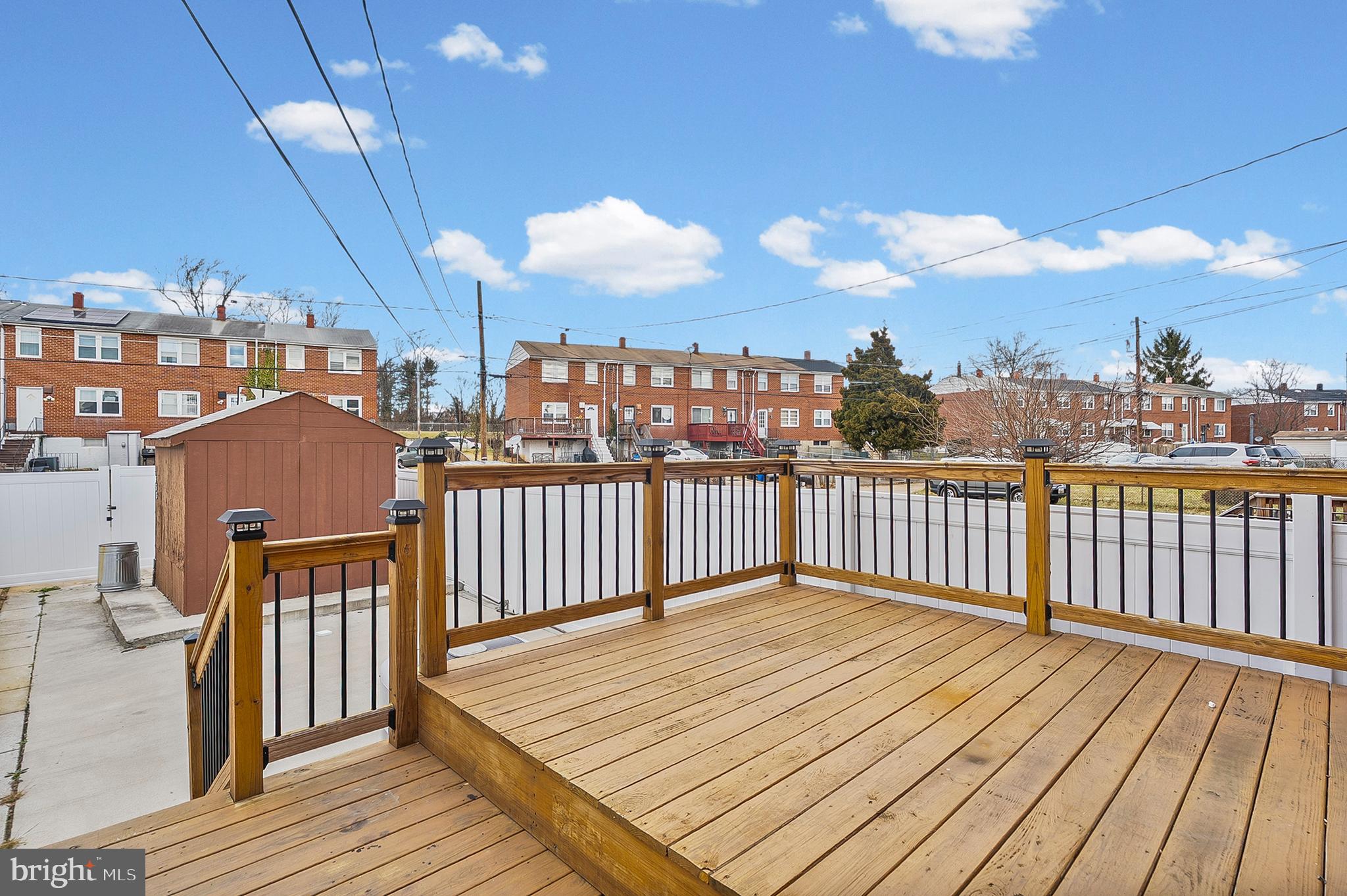 6955 Blanche Road Baltimore, MD 21215 - Photo 25 of 26 a view of a balcony with wooden floor