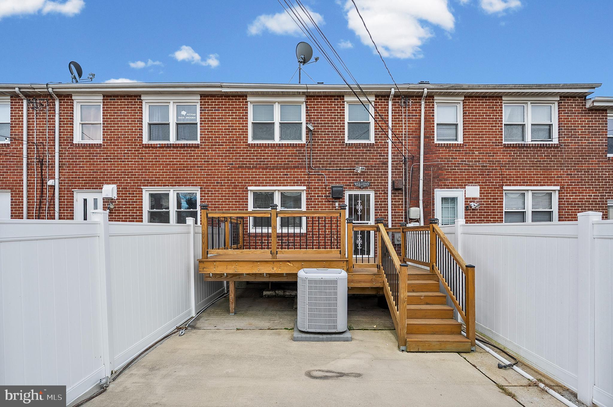 6955 Blanche Road Baltimore, MD 21215 - Photo 26 of 26 a view of a house with more windows and stairs