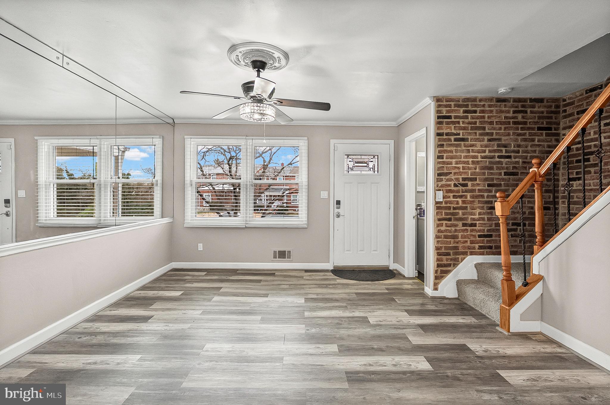 6955 Blanche Road Baltimore, MD 21215 - Photo 3 of 26 a view of an empty room with a window