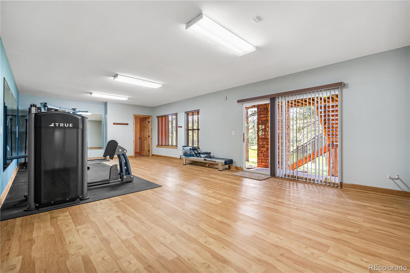691 Cumberland Road Larkspur, CO 80118 - Photo 36 of 43 a view of a room with gym equipment