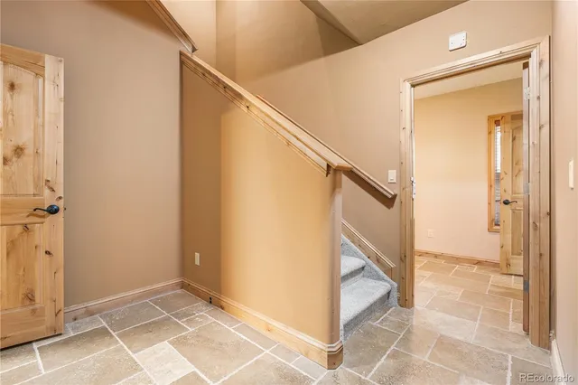 a view of a house with backyard of the house