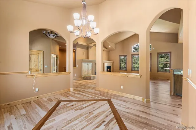 a kitchen with a stove and a refrigerator
