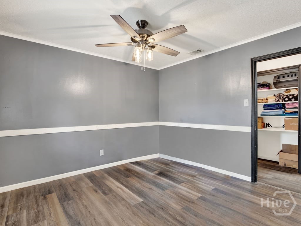 125 Westwood Drive Rincon, GA 31326 - Photo 21 of 37 Bedroom chair rail & Fan