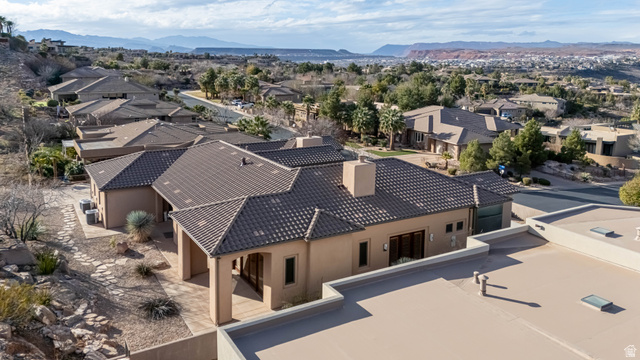 2464 East Granite Way St. George, UT 84790 - Photo 7 of 106 Aerial view of residential area featuring a mountain backdrop