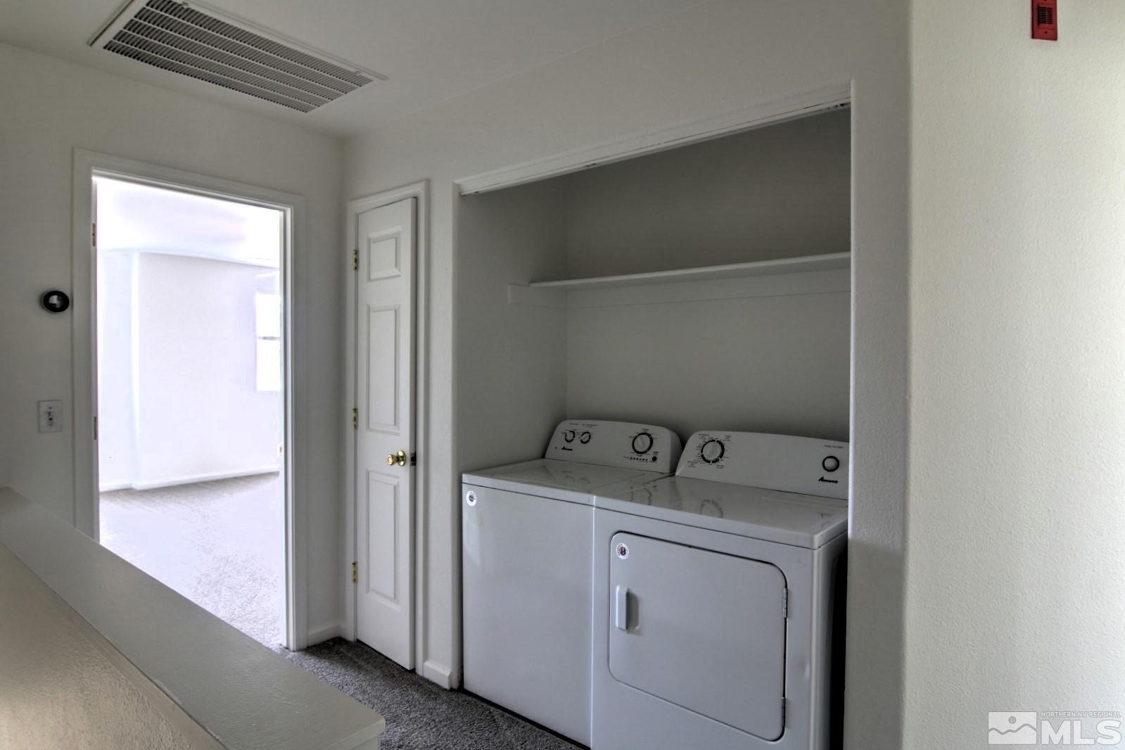 433 Holcomb Avenue Reno, NV 89502 - Photo 13 of 31 a utility room with dryer and washer