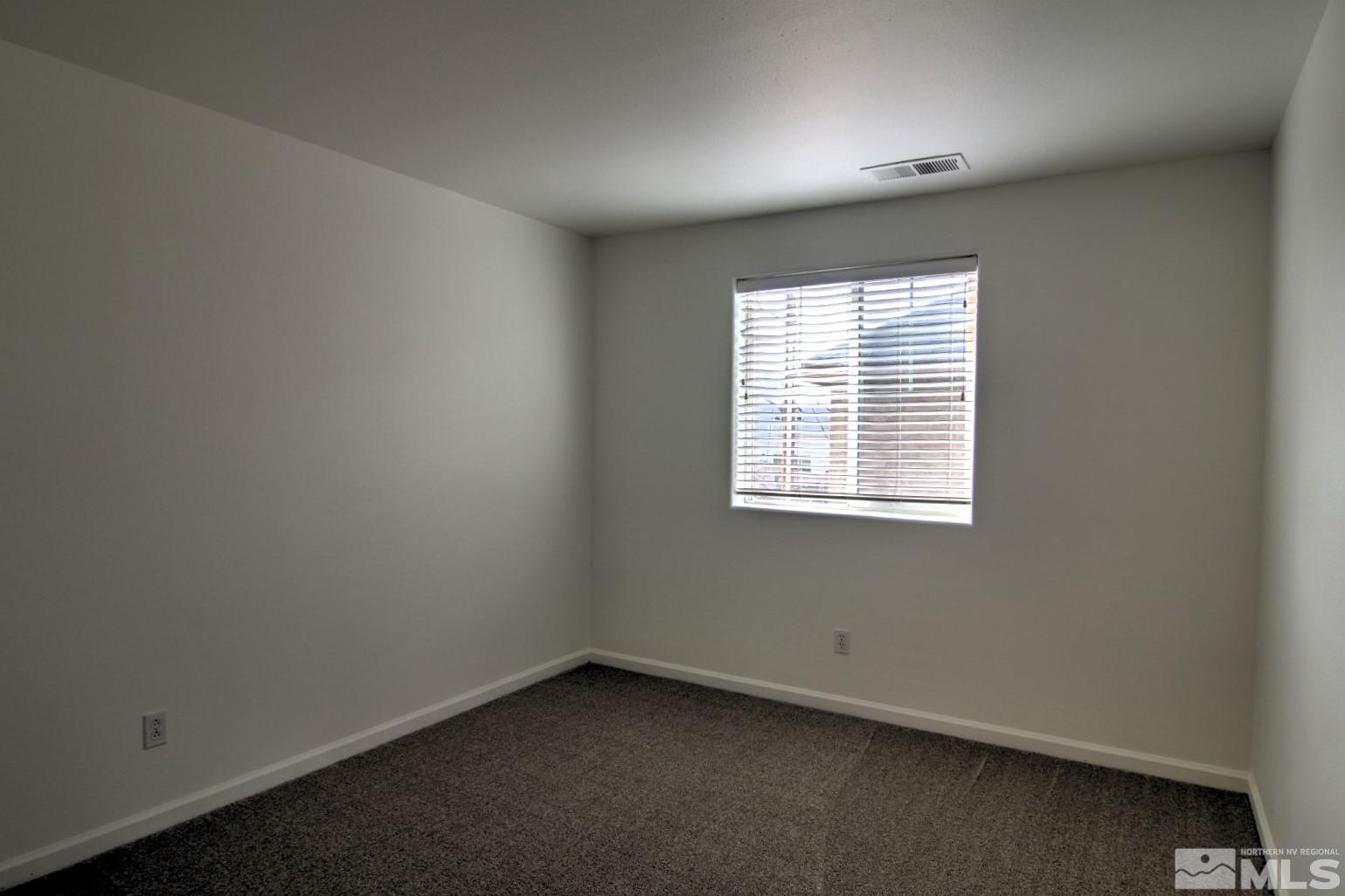 433 Holcomb Avenue Reno, NV 89502 - Photo 18 of 31 an empty room with a window