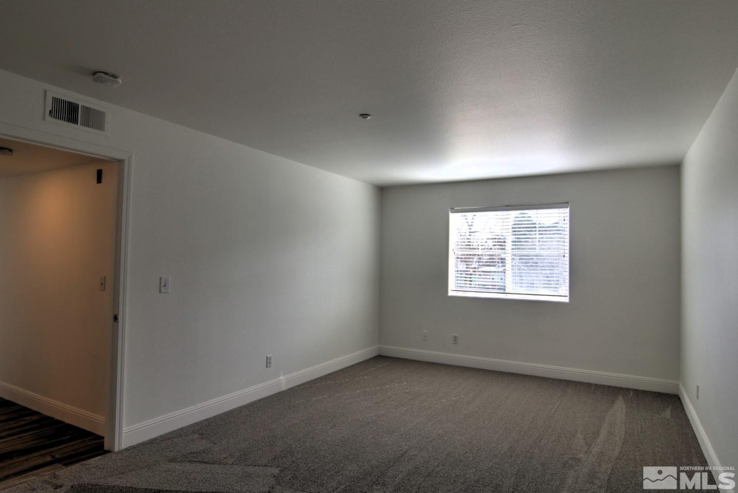 433 Holcomb Avenue Reno, NV 89502 - Photo 10 of 31 an empty room with a window