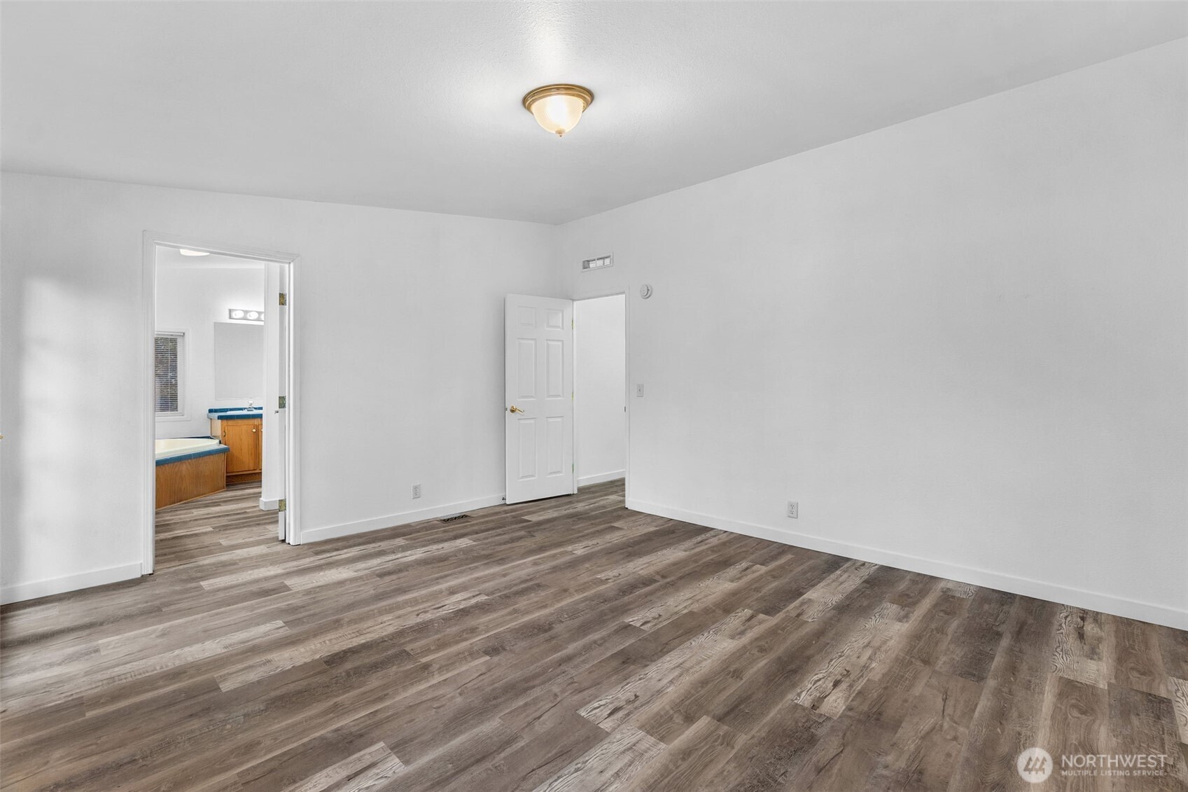 71 East Rhododendron Place Shelton, WA 98584 - Photo 16 of 38 a view of empty room with wooden floor