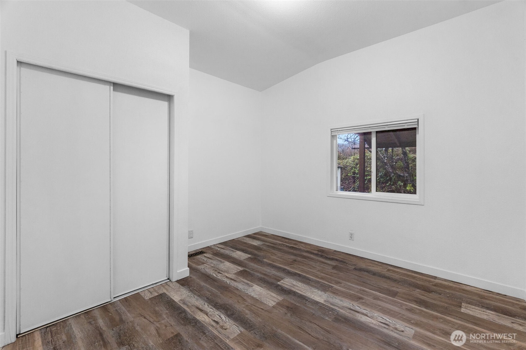 71 East Rhododendron Place Shelton, WA 98584 - Photo 21 of 38 an empty room with a window