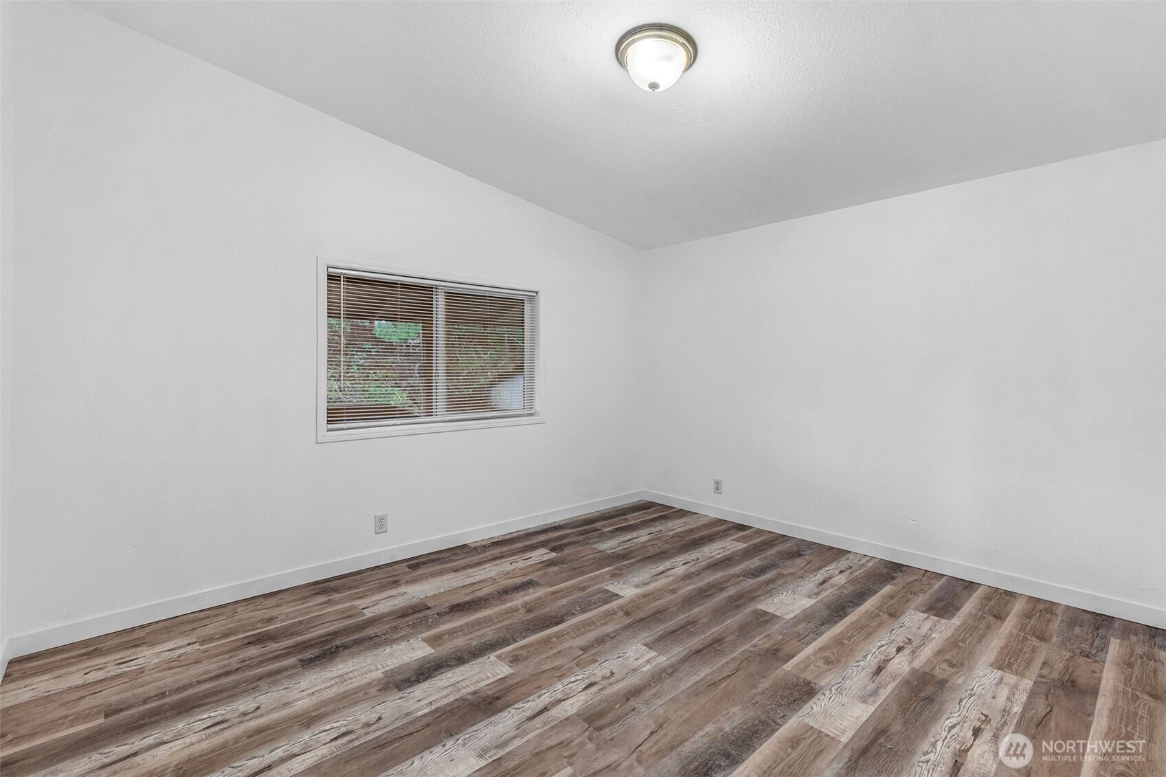 71 East Rhododendron Place Shelton, WA 98584 - Photo 22 of 38 an empty room with a window