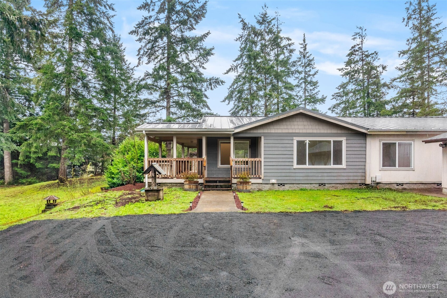 71 East Rhododendron Place Shelton, WA 98584 - Photo 34 of 38 a view of swimming pool with sitting area and garden