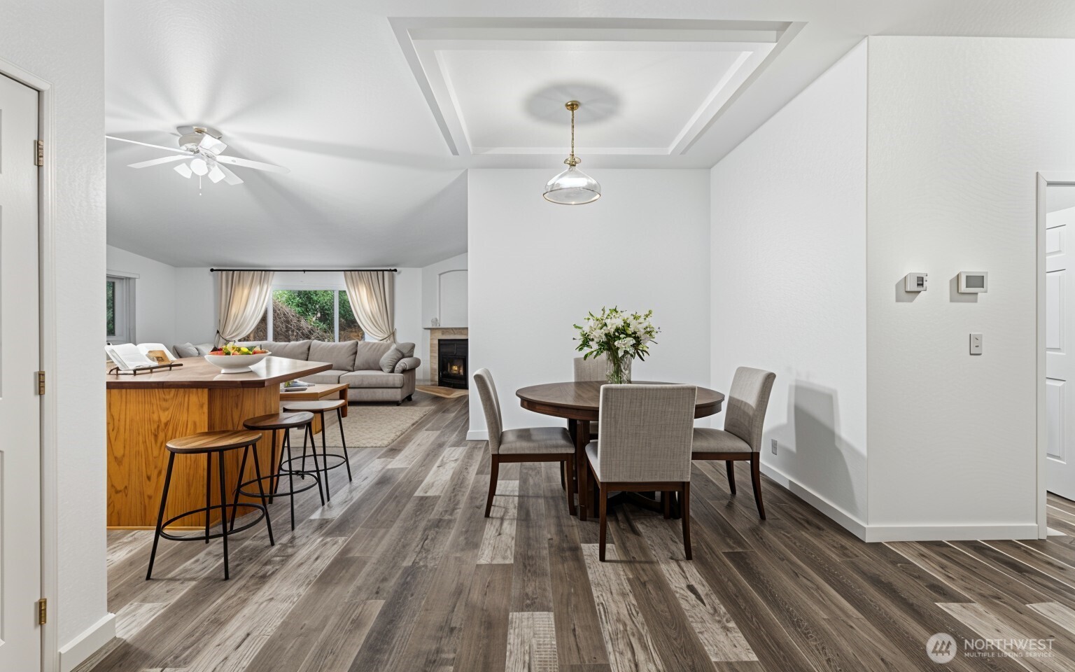 71 East Rhododendron Place Shelton, WA 98584 - Photo 6 of 38 a view of a dining room with furniture and wooden floor