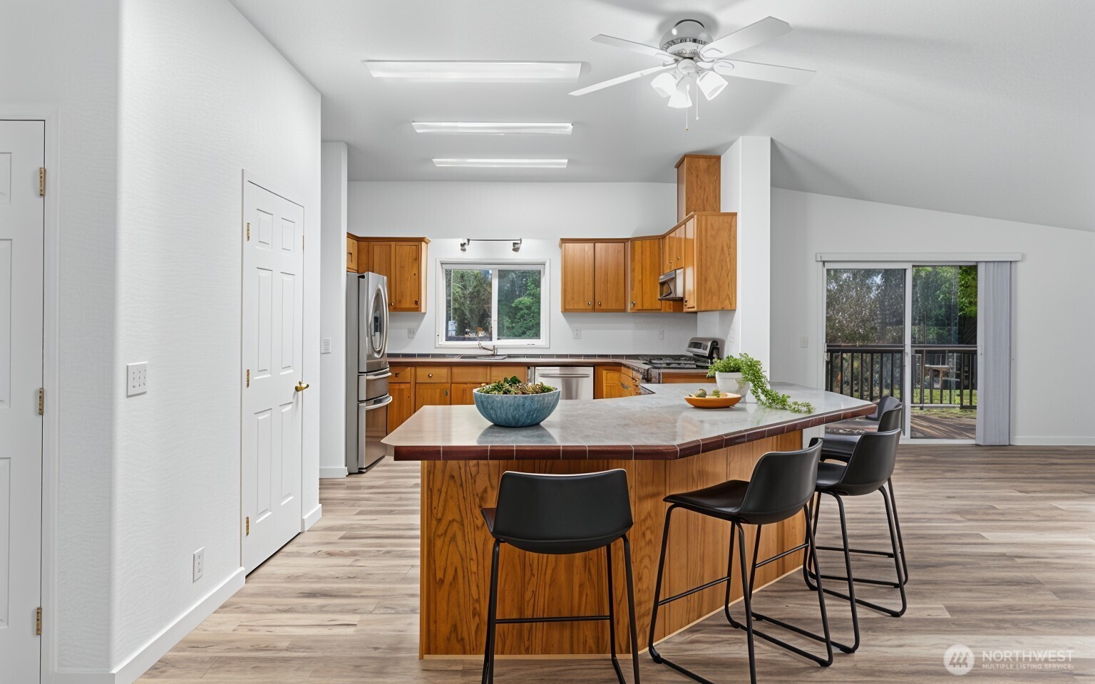71 East Rhododendron Place Shelton, WA 98584 - Photo 8 of 38 a view of a kitchen with a table and chairs