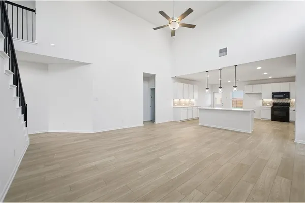 a view of a kitchen with a sink and a kitchen