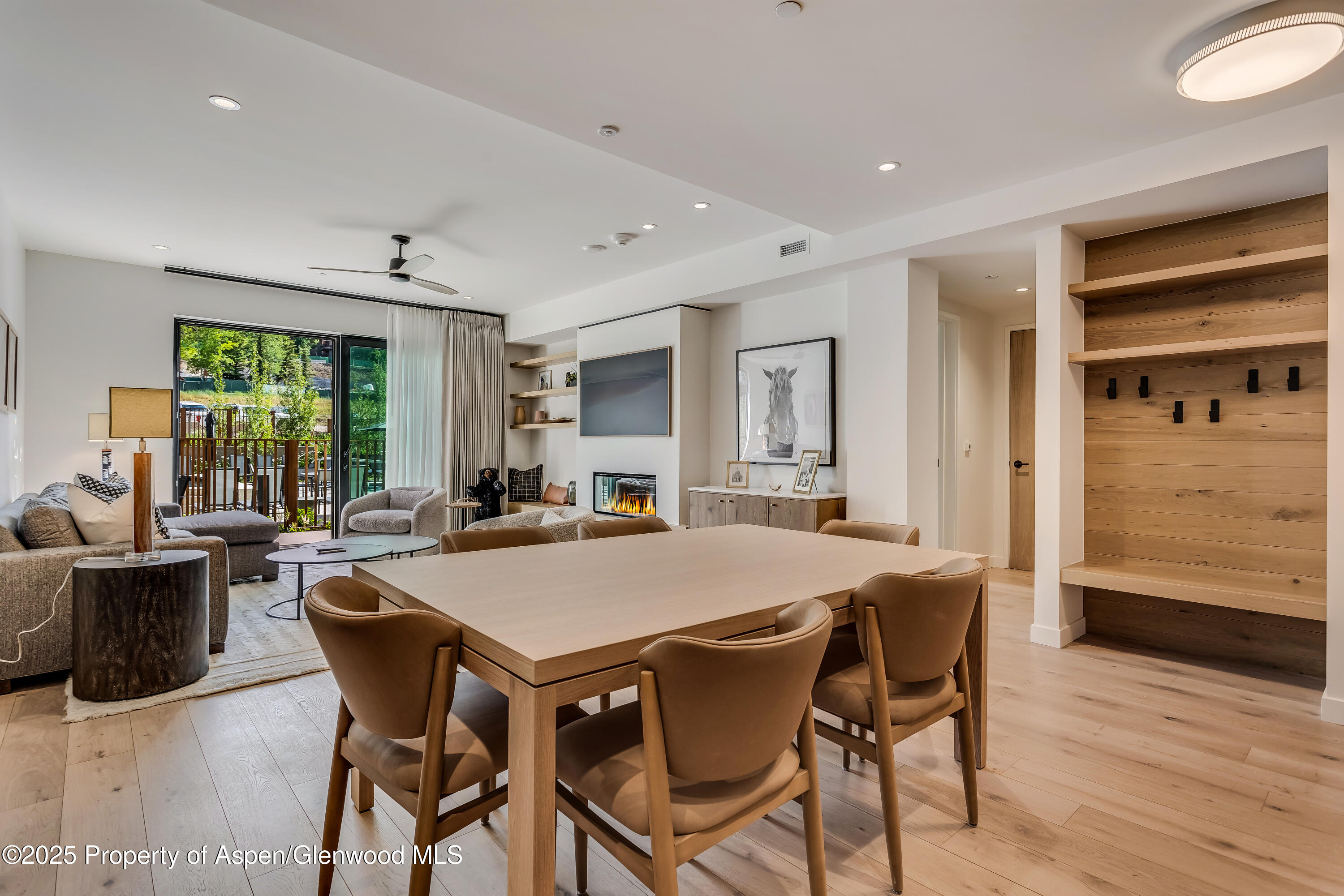119 Wood Road, Unit 103 Snowmass Village, CO 81615 - Photo 5 of 23 a view of a dining room with furniture and window