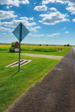 a view of a golf course with a lake