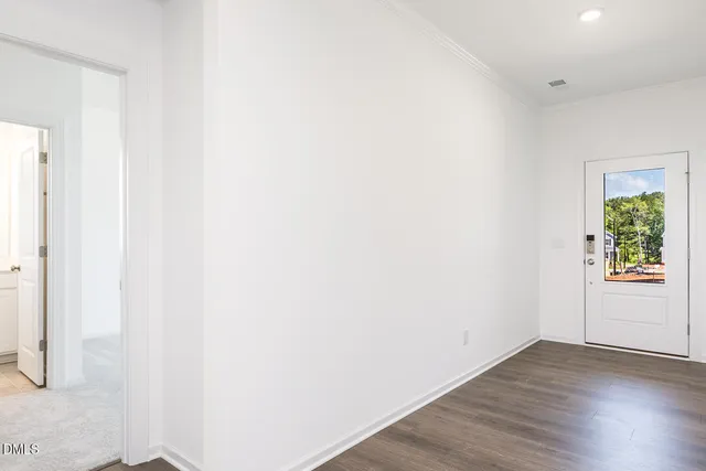 a kitchen with stainless steel appliances a white stove top oven sink and cabinets