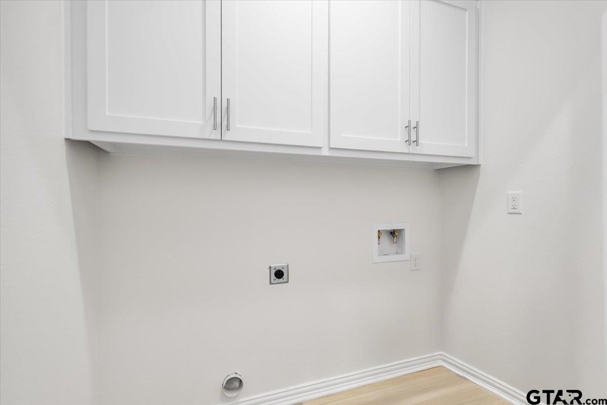 1310 West Claude Street Tyler, TX 75702 - Photo 23 of 27 a view of white cabinets
