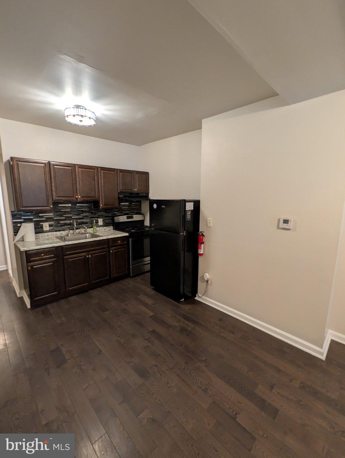 5933 Trinity Street Philadelphia, PA 19143 - Photo 13 of 18 Modern kitchen with sleek finishes.