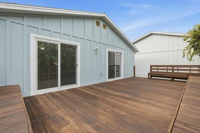 a view of a backyard of the house